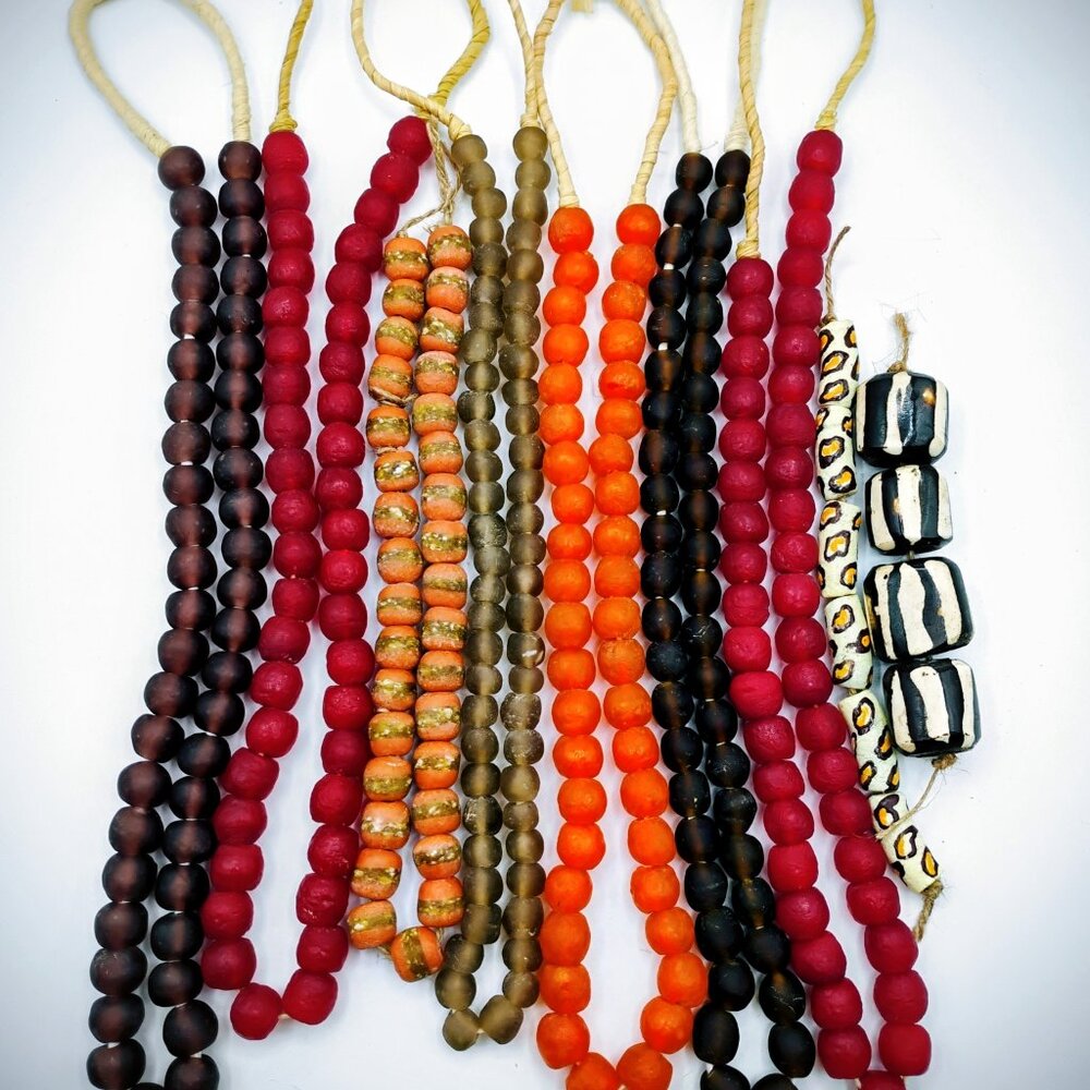 Detash beads lot: 9 strands brown, red, orange, black & white